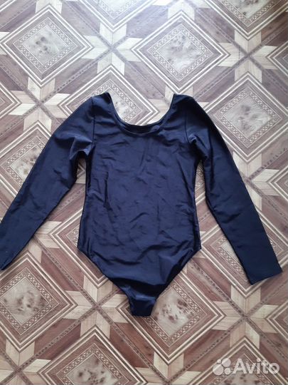 Продам новый костюм гимнастический для девочки