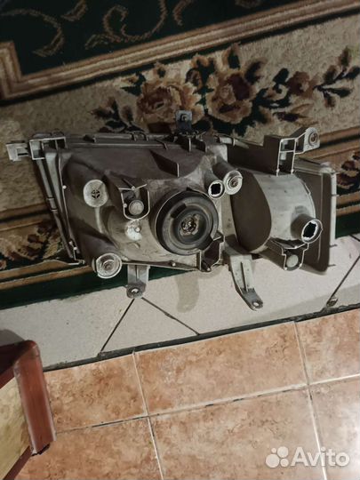 Фара левая Toyota Probox Оригинал