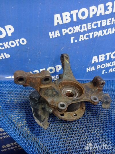 Передний правый поворотный кулак Opel Corsa D