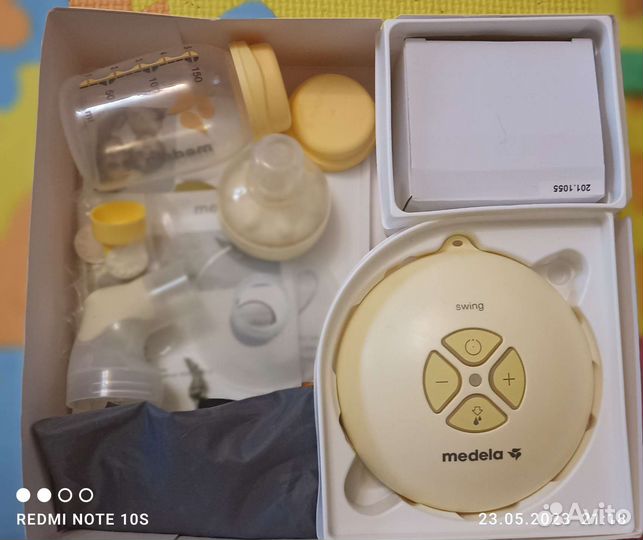 Молокоотсос medela swing электрический
