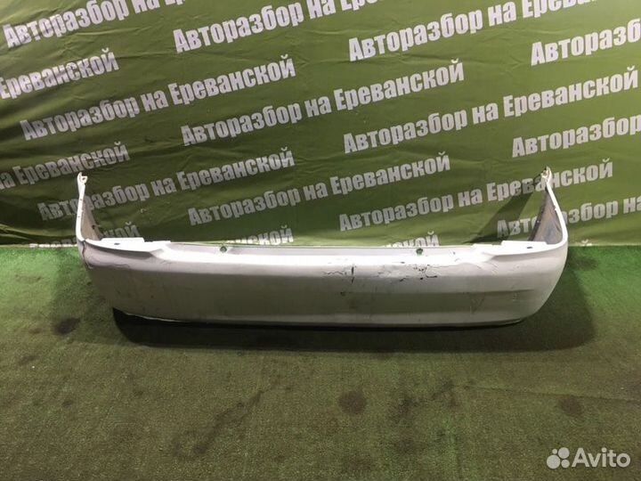 Бампер задний Mazda Familia BJ ZL 1999