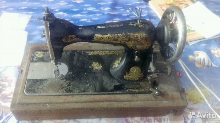 Швейная машинка Сингер