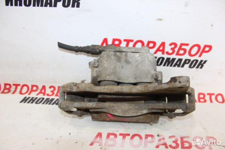 Суппорт тормозной передний левый Chevrolet Niva