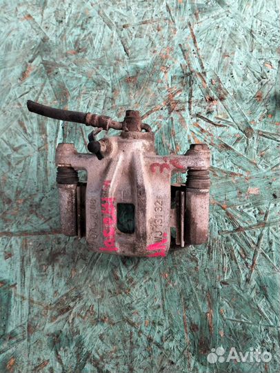 Суппорт задний левый Chevrolet Iacetti