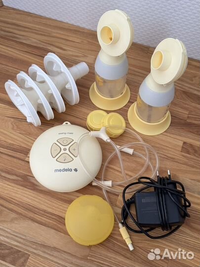 Молокоотсос Medela swing maxi flex