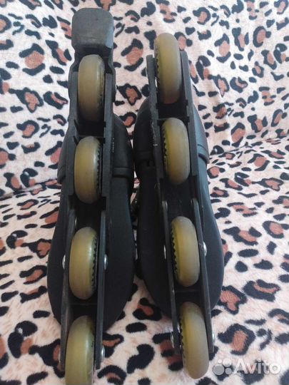 Роликовые коньки