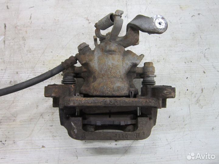 Суппорт тормозной задний Mitsubishi Outlander 3