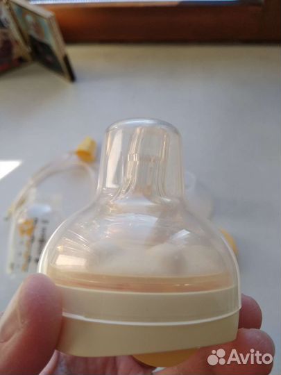 Молокоотсос medela swing электрический