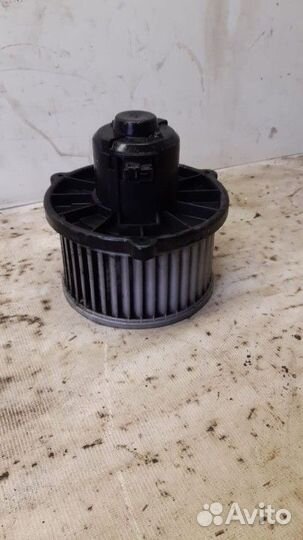 Моторчик отопителя Kia Shuma