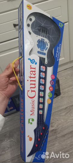 Музыкальная детская гитара
