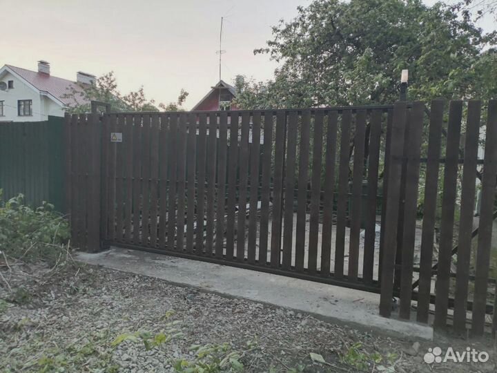 Откатные ворота с калиткой