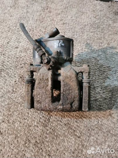 Суппорт тормозной задний правый Volkswagen Tiguan