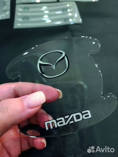 Защитные наклейки под ручки авто Mazda