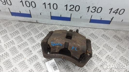Суппорт тормозной передний левый nissan primera P1