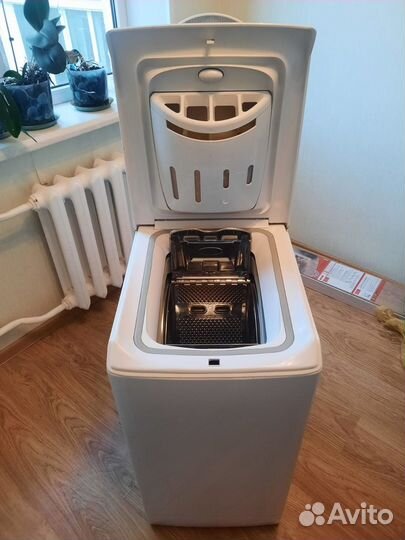 Стиральная машина с вертикальной загрузкой