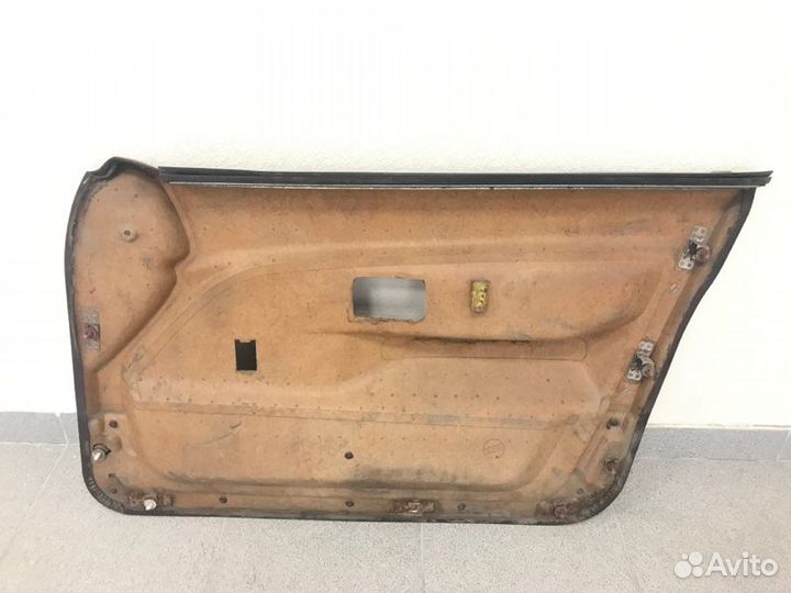 Накладка двери передняя левая Toyota Corolla 4AFE