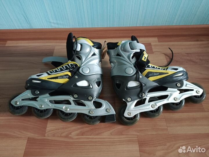 Роликовые коньки