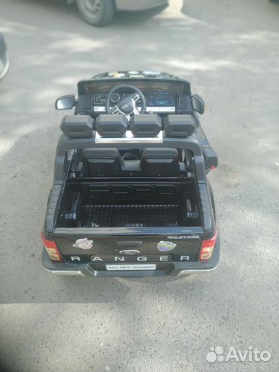 Детский электромобиль двухместный