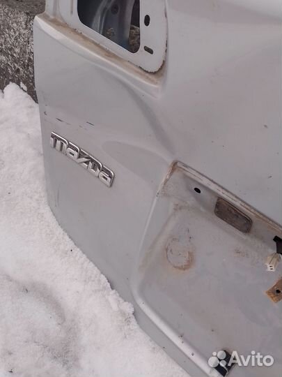 Дверь задняя Мазда демио 2005г