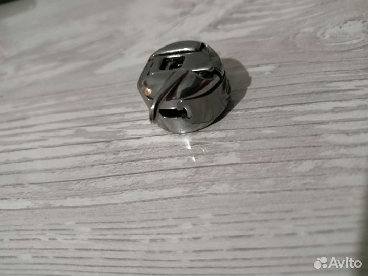 Шпульный колпачек, челнок бытовой швейной машинки