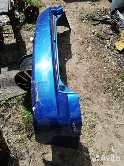 Бампер задний Мазда Демио 1