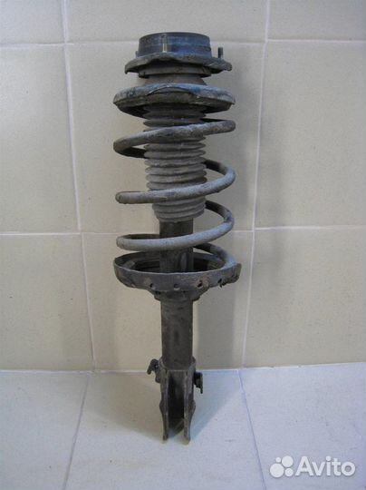 Стойка амортизатора передняя правая Subaru Forest