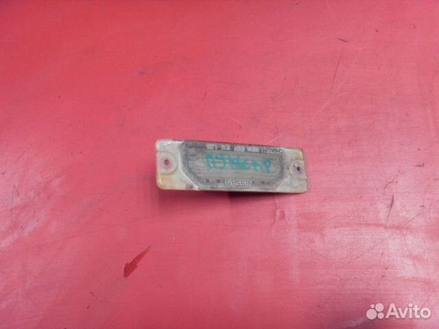 Фонарь подсветки номера 265103J100 Nissan Pulsar