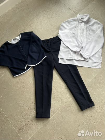 Комплект одежды на девочку 128-134