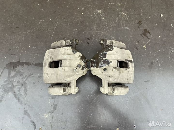 Суппорт тормозной передний Hyundai solaris, KIA