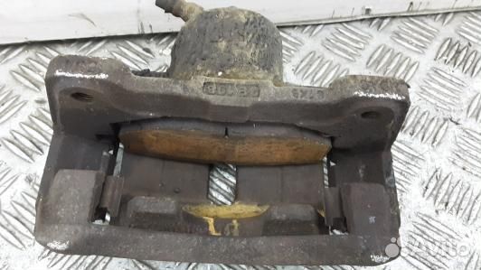 Суппорт тормозной передний левый chevrolet epica