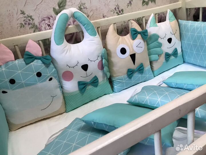 Комплект подушек в кроватку