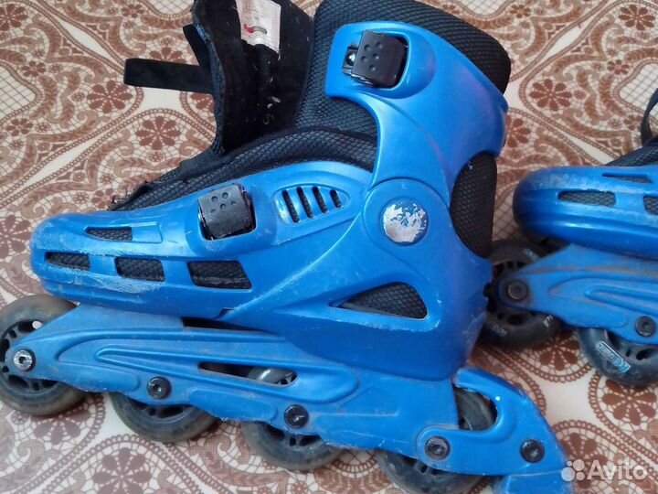 Роликовые коньки