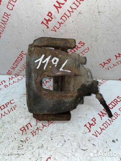 Суппорт тормозной передний левый Mazda 3 BL седан