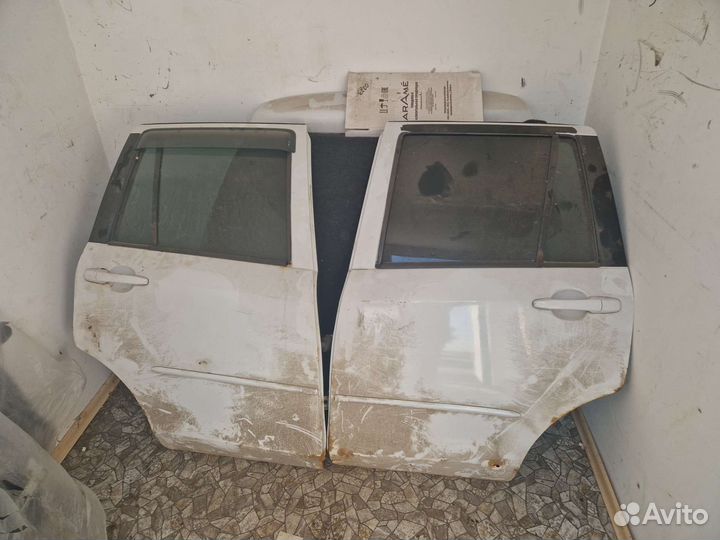 Мазда демио