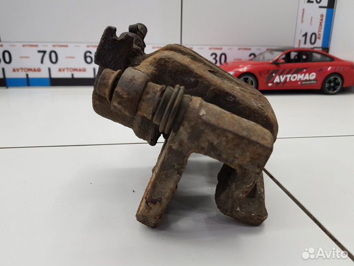 Суппорт задний левый