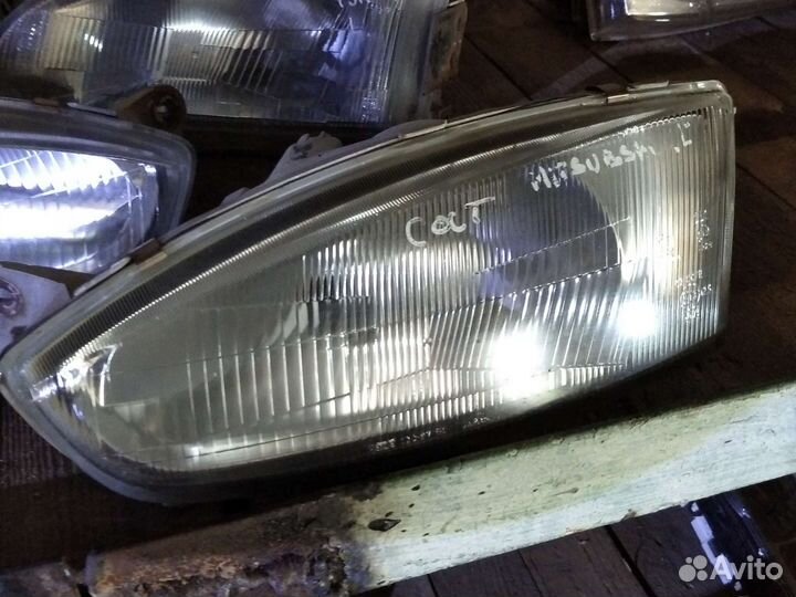 Фара передние Митсубиси Кольт CJO