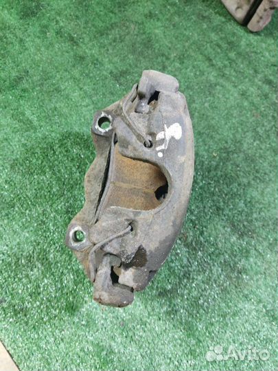 Суппорт тормозной передний правый Opel Astra H