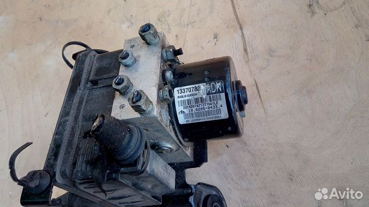 Блок ABS ADN 13370782 на Опель Astra J