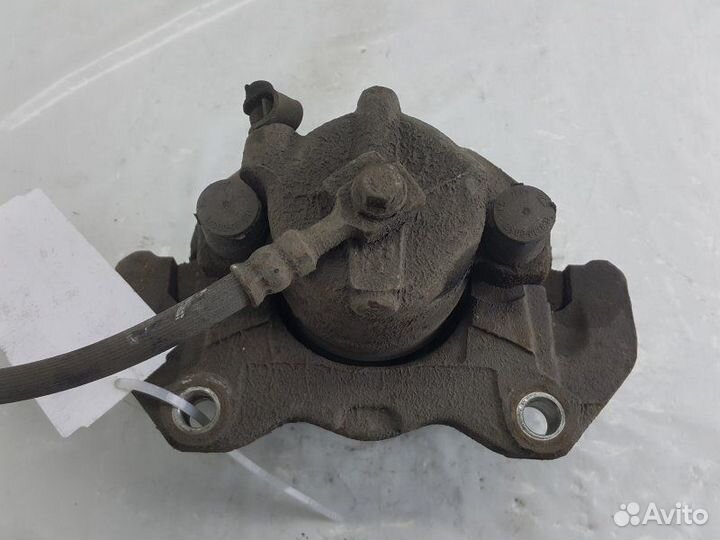 Суппорт тормозной передний левый Opel Astra