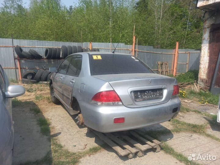 Запчасти лансер 9