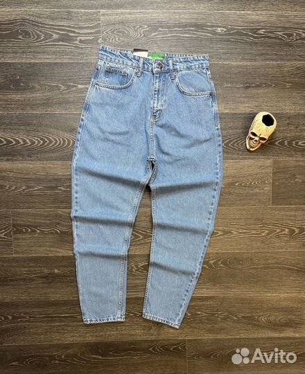 Джинсы Lacoste