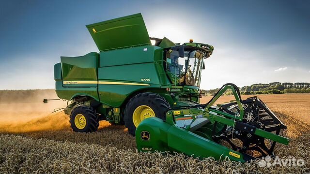 Шнек № AH204943 комбайна John Deere