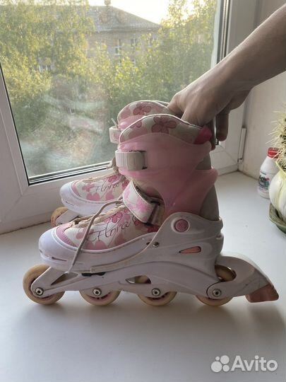 Роликовые коньки