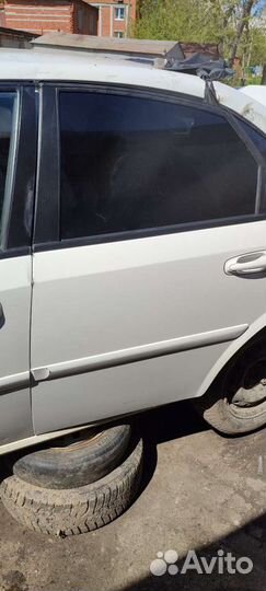 Задняя левая дверь шевроле лачетти