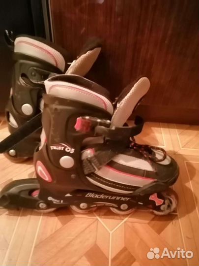 Роликовые коньки