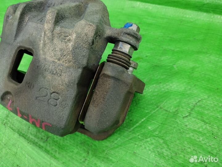 Суппорт передний правый Tucson / Sportage 04-10