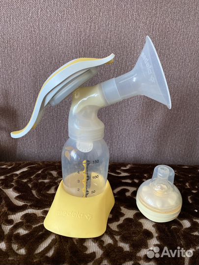 Молокоотсос medela ручной