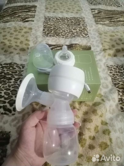 Молокоотсос электрический новый