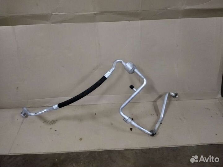 Трубка кондиционера Рено Логан 1