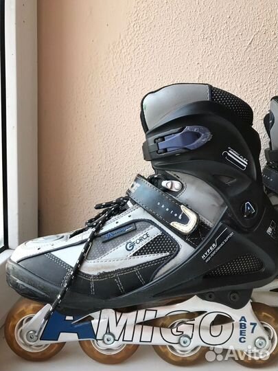 Роликовые коньки